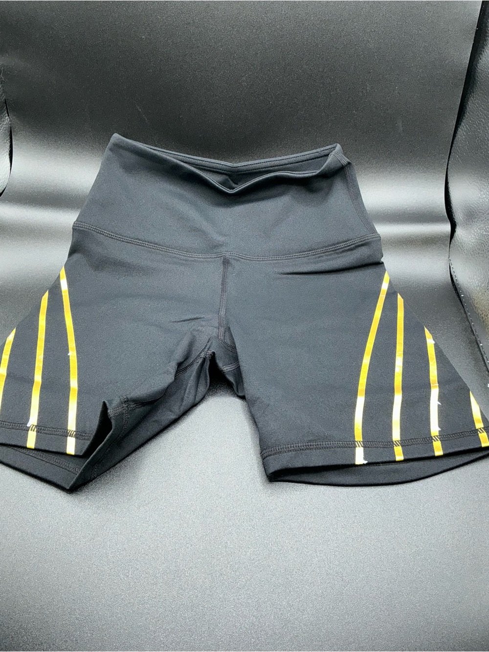High-Rise Black Athletic Bike Shorts with Yellow Stripe Detail